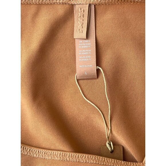 SKIMS Kim Kardashian Wet Jersey Cutout Swimsuit in Orche - Picture 8 of 9